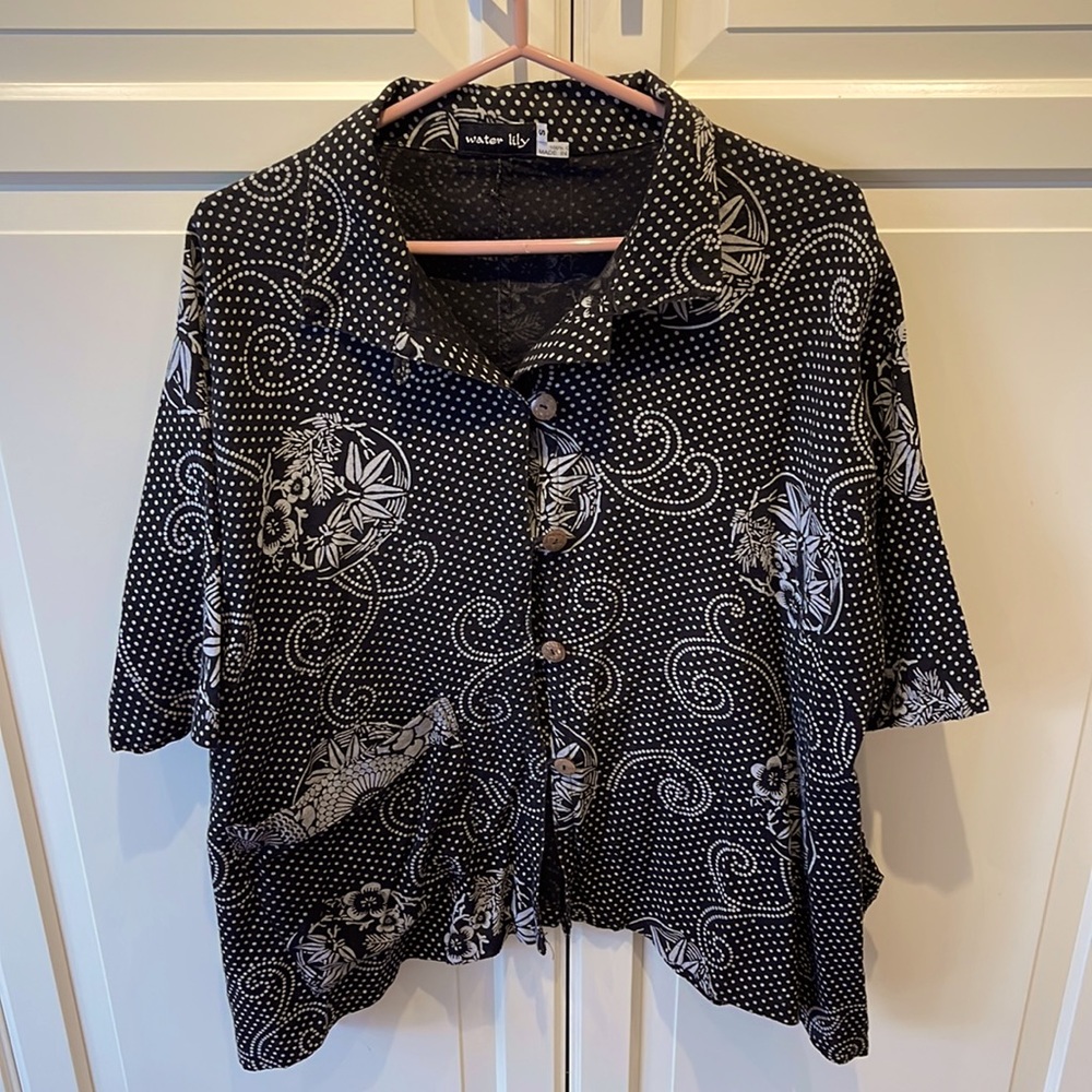 Unusual drapey cotton shirt with one pocket.
